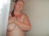 Redhead taking shower