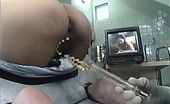 MILF Bound In A Machine And Takes An Enema In Her Ass