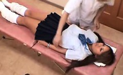 Dazzling Asian teen has a masseur working his hands on her