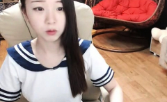 Asian college girl does solo in dorm room