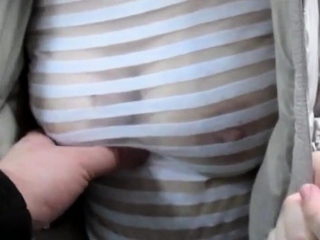 Touching tits in see-throu blouse in a market