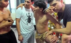 Two randy gay fellas giving blowjobs in group sex action