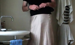 Demurely dressed crossdresser wanking and cumming