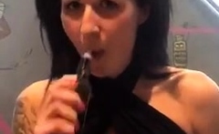 Showing off her boob's tricks at the vape shop